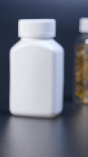 药片胶囊瓶罐泼洒慢动作保健品药物14秒视频