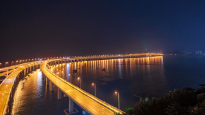 8K大连星海湾跨海大桥夜景延时海滨城市交通桥梁16秒视频