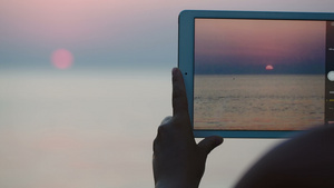 拍下海边日落的照片16秒视频