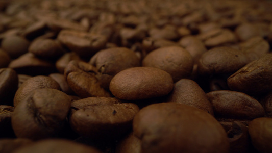 咖啡豆背景关闭咖啡种子的种子视频