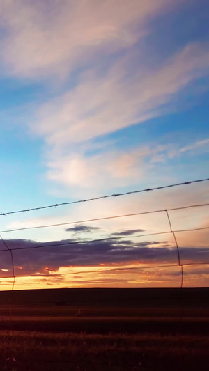 60帧延时拍摄鄂尔多斯草原地平线上日落的景象内蒙古39秒视频