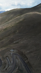 航拍5A帕米尔旅游景区蜿蜒崎岖的盘龙古道视频旅游景点视频