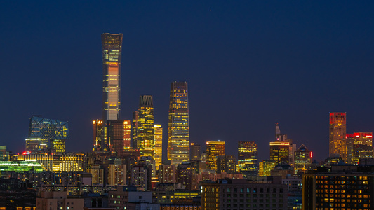 8K震撼延时北京国贸CBD日转夜蓝色时刻灯光夜景视频