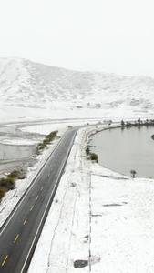 草原公路雪景航拍视频交通运输视频