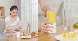 女孩用榨汁机榨橙汁20秒视频