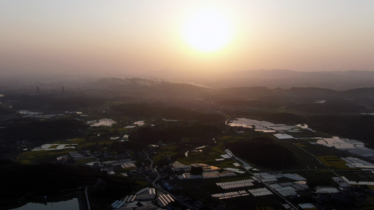 4K航拍夕阳下的田园风光视频