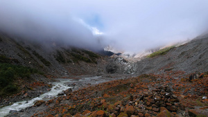 航拍5A景区甘孜州海螺沟红石滩与贡嘎雪山视频63秒视频