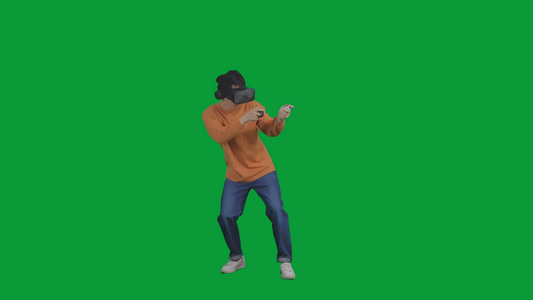  4K绿幕男青年使用VR设备玩射击游戏视频