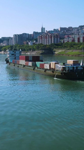 航拍远洋货轮满载集装箱行驶长江中长江水视频