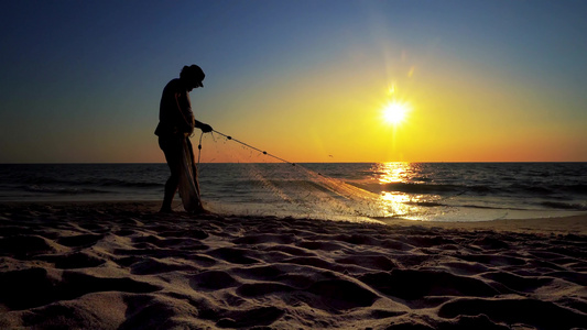 日落海滩电影制片人Standicam拍摄到的捕渔网视频