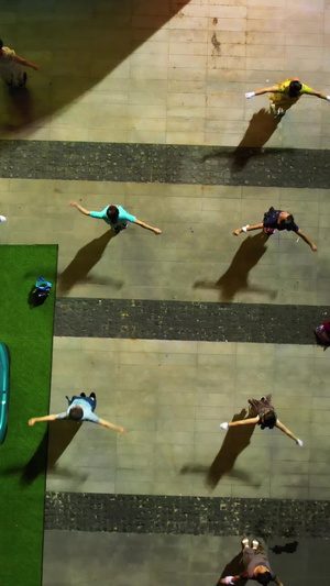 航拍城市夜晚上跳广场舞运动健身养生娱乐的人群素材运动素材53秒视频