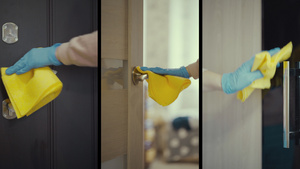 女人用洗涤剂和湿毛巾在消毒门把手12秒视频