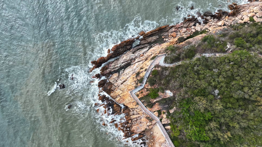 航拍海边岩石海滩沿海公路海景4k素材视频