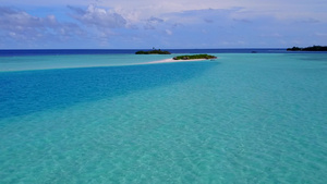 以蓝水和白沙底背景的蓝色水为缓冲海岸海滩休息时间的9秒视频