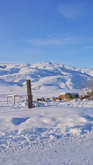 冬季大雪下的新疆禾木村庄长镜头白雪皑皑56秒视频