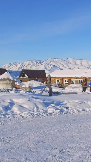冬季大雪下的新疆禾木村庄长镜头大雪天56秒视频