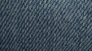 粗蓝色织物背景牛仔裤纹理15秒视频