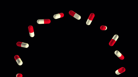 它们飞起来又围成一圈没有背景飞行红色和白色药片的慢动作视频