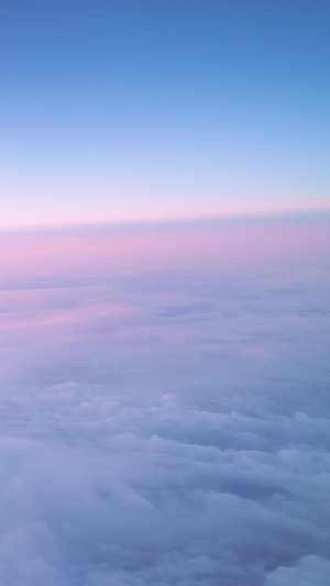 旅行途中飞机内视角晚霞云彩20秒视频