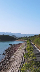 航拍城市海边的交通道路街景海景宣传用素材视频