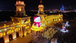 4k航拍哈尔滨音乐长廊大雪人夜景13秒视频