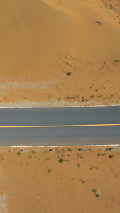 腾格里航拍沙漠公路特写高大复合型沙丘视频