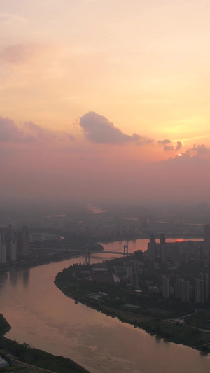航拍城市夕阳晚霞落日天空蜿蜒的河流桥梁道路素材落日素材58秒视频