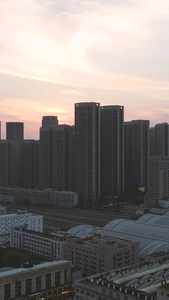 航拍城市风光落日晚霞夕阳天空素材城市建设视频