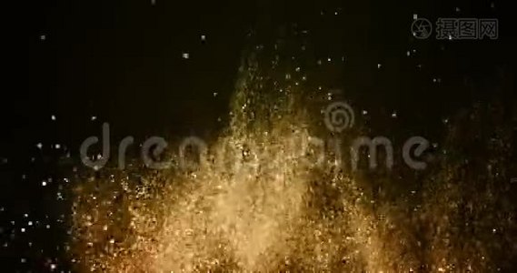 圣诞节金色渐变闪光爆炸尘埃粒子背景，波克在缓慢下降视频