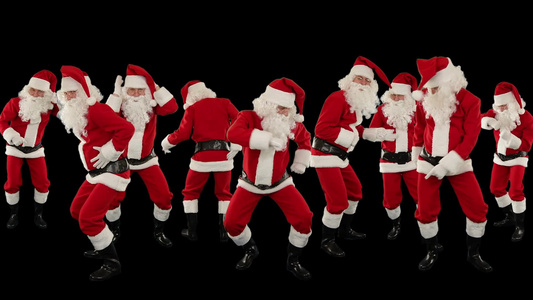 一群圣诞老人在黑色的背景下跳舞视频