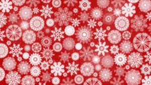 红色背景上圣诞雪花背景的循环20秒视频