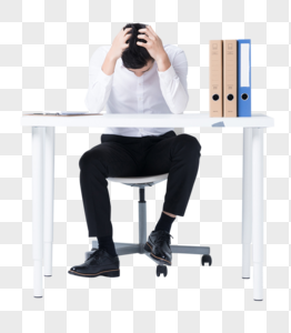 坐在办公桌前低头沮丧的商务白领图片高清图片