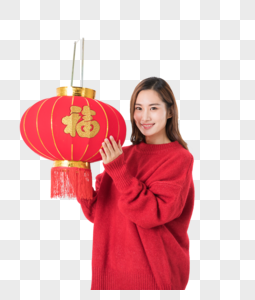 提着红灯笼的年轻女性图片