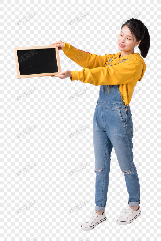 站着拿小黑板展示的活力女性图片图片