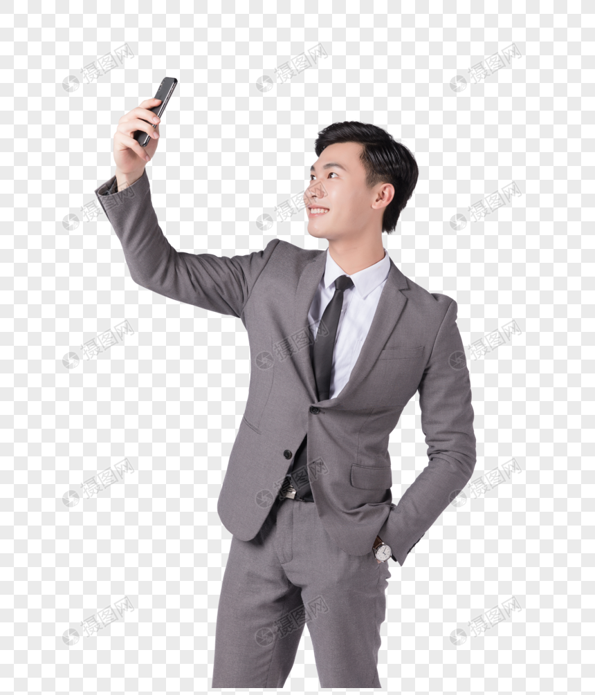 商务男士用手机拍照图片图片