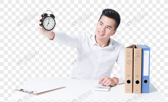 办公桌前手拿闹钟的商务男性图片