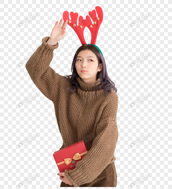 手拿礼盒带着鹿角的圣诞女性人像图片