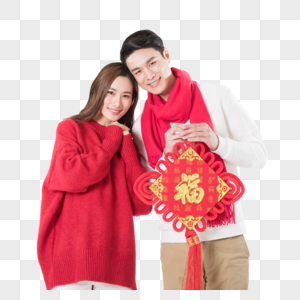 年轻夫妻拿着新年中国结高清图片