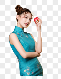 旗袍美女双丸子头手拿苹果图片