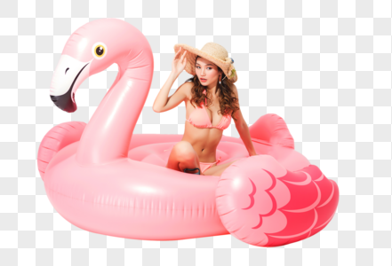 粉色比基尼的可爱美女坐在火烈鸟游泳圈高清图片
