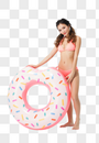 穿粉色比基尼的可爱女生拿着甜甜圈泳圈图片