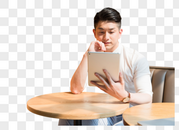 咖啡馆休闲放松使用笔记本电脑的年轻男性图片