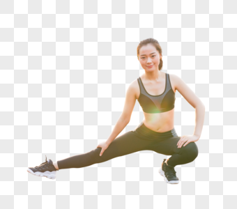 操场运动锻炼做拉伸动作的女生图片