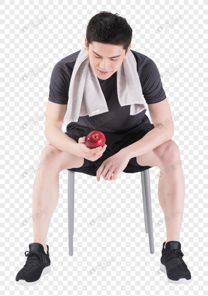 健身男性手拿苹果图片
