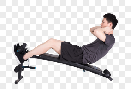 仰卧板上做仰卧起坐的健身男性图片