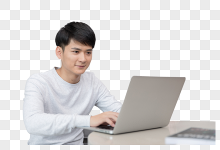 坐在沙发上打电脑的年轻男士图片