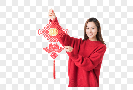 新年女性拿红色中国结高清图片