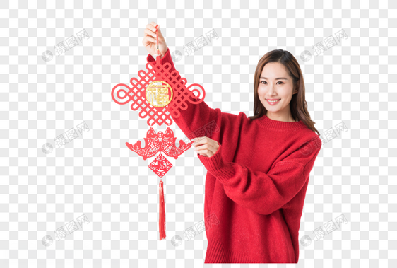 新年女性拿红色中国结图片