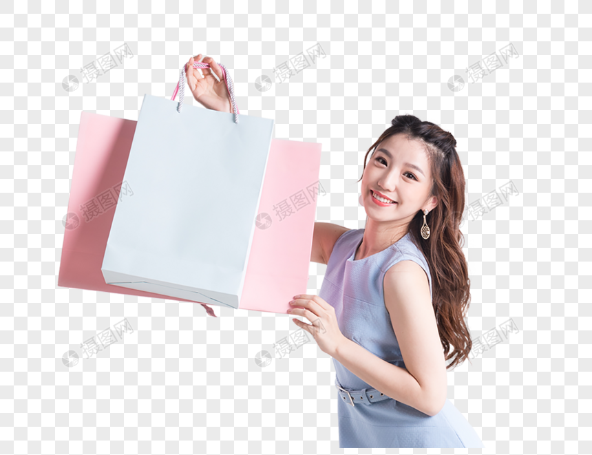 购物狂  欢展示购物袋的女性图片