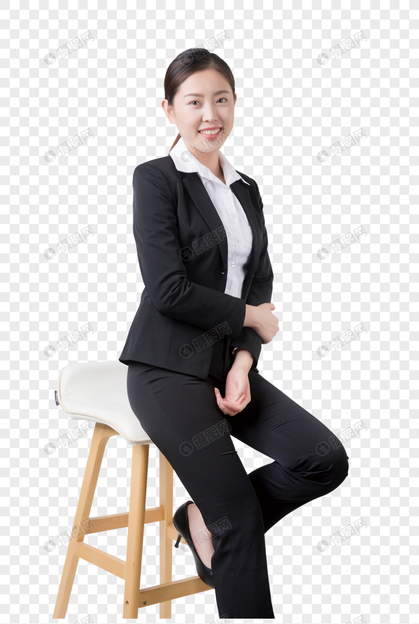 坐凳子上的商务女性图片